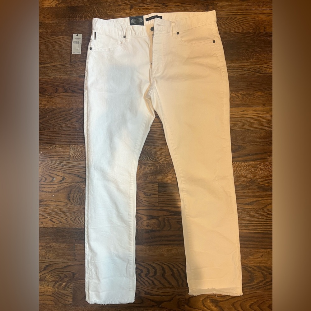 New men’s white jeans with frayed hem